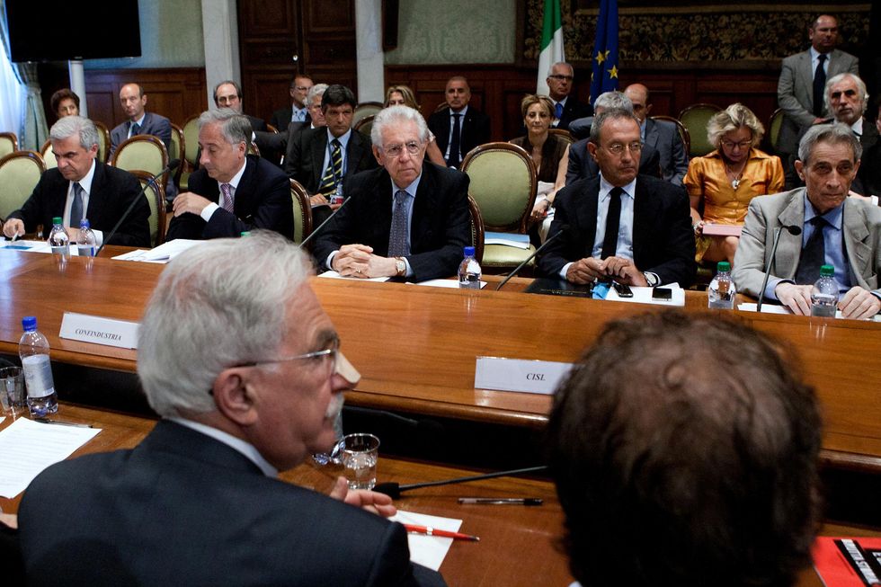 Monti urges companies and unions to bridge Italy's "productivity gap"