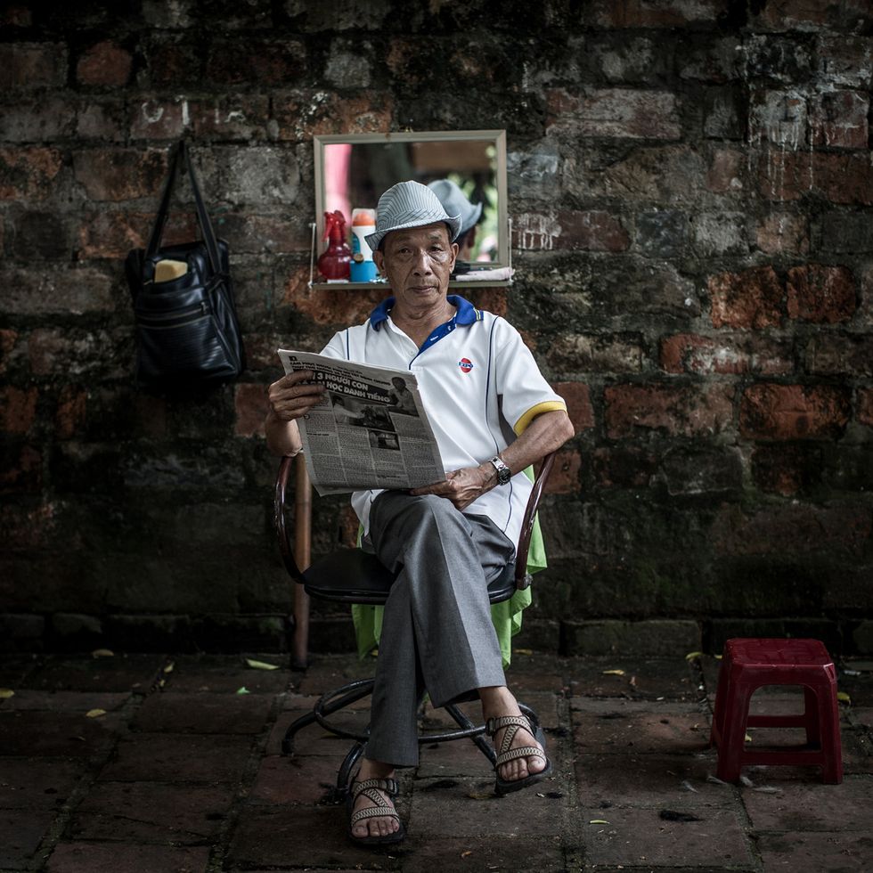 I barbieri di strada di Hanoi