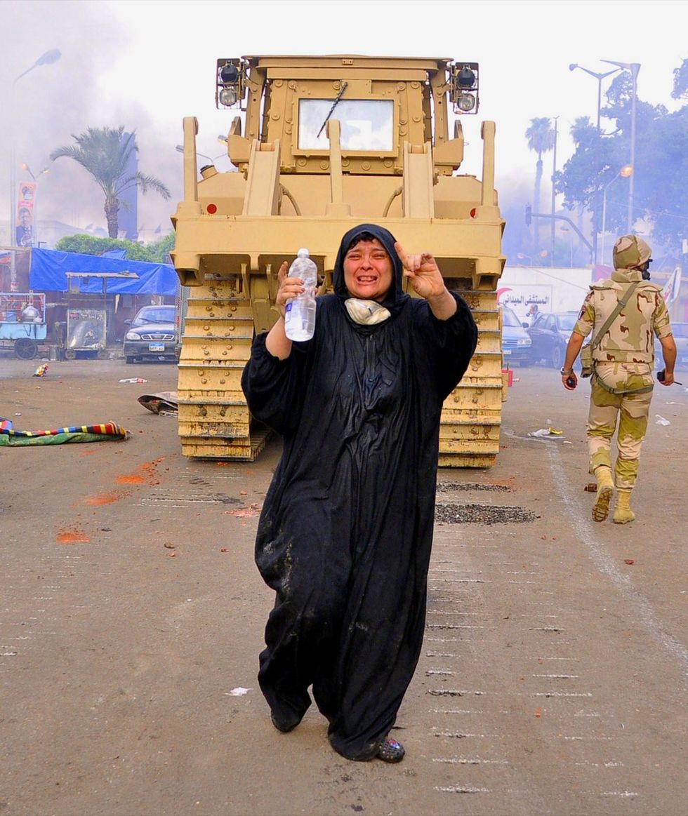 La strage in Egitto e altre foto del giorno, 14.8.13