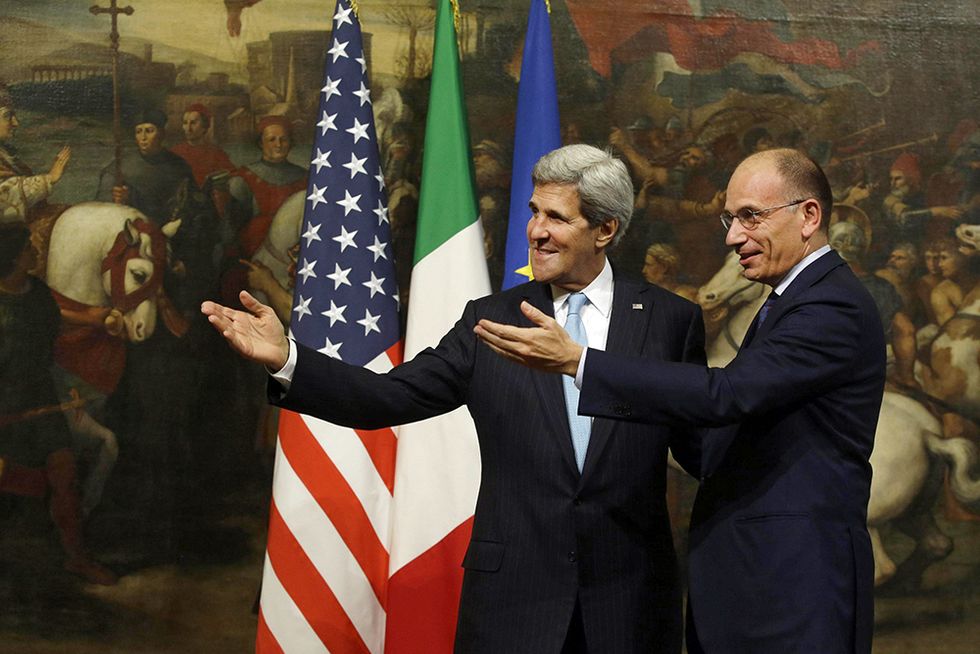 John Kerry da Letta e altre foto del giorno, 23.10.2013