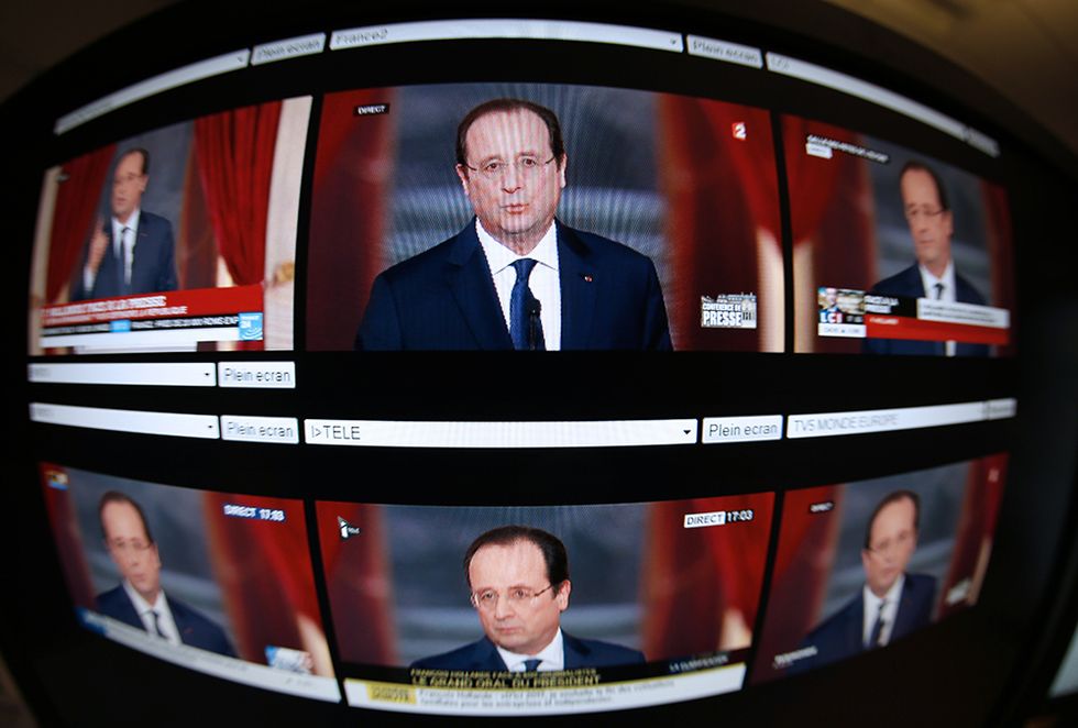 Hollande risponde su Julie Gayet e altre foto del giorno, 14.1.2014