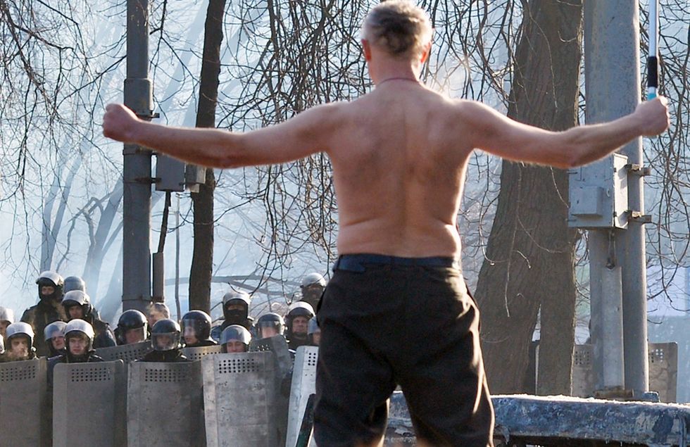 I disordini in Ucraina e altre foto del giorno, 20.1.2014