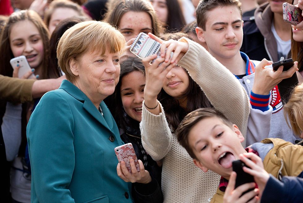 I selfie con Angela Merkel e altre foto del giorno, 31.03.2014