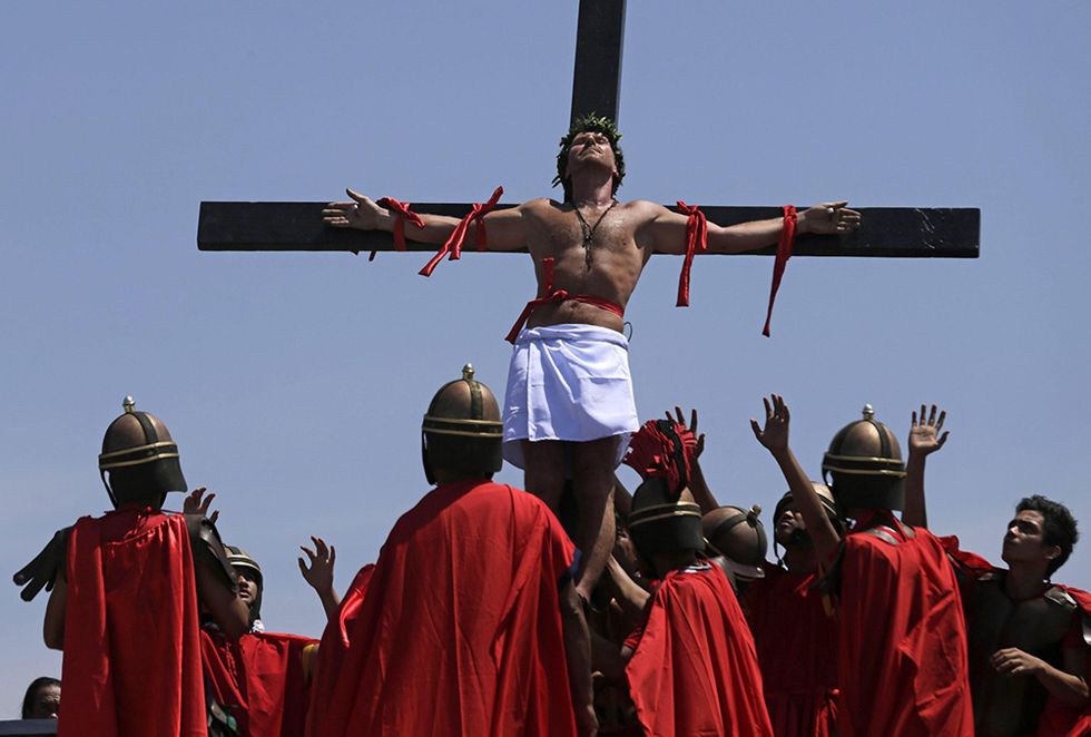 Le celebrazioni del Venerdì santo e altre foto del giorno, 18.04.2014