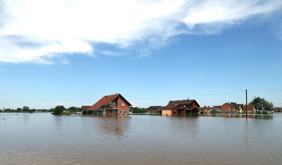 Le alluvioni nei Balcani e altre foto del giorno, 20.05.2014