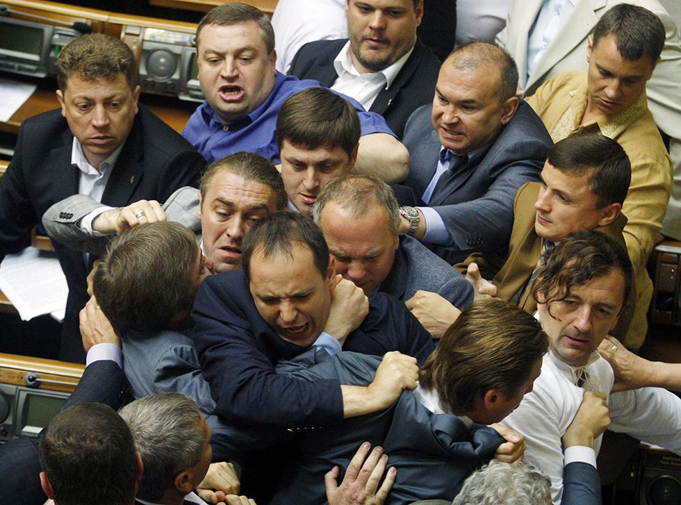 Rissa in Parlamento a Kiev e altre foto del giorno, 22.07.2014