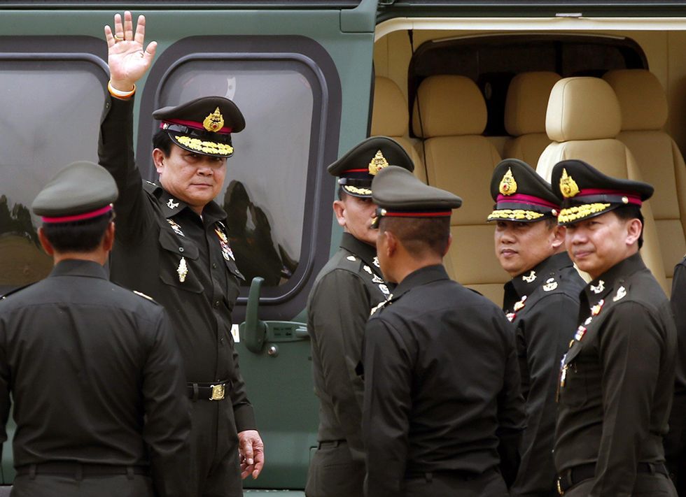 Il governo ai militari in Thailandia e altre foto del giorno, 21.08.2014