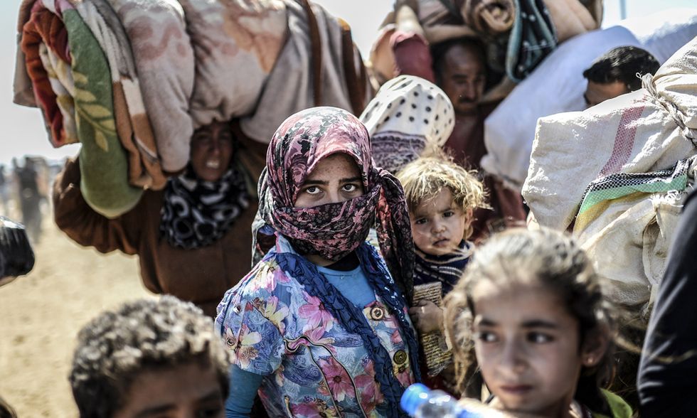 In fuga dall'Isis: i profughi curdi verso la Turchia