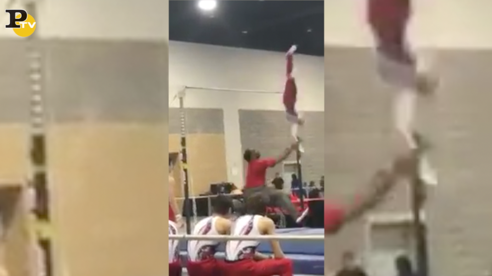 Atleta cade dalla sbarra, allenatore lo salva prendendolo al volo | video