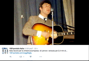 John Lennon con la sua Gibson