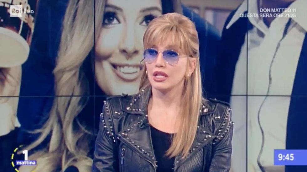 Milly Carlucci a Uno Mattina apprende in diretta tv la morte di Bibi Ballandi