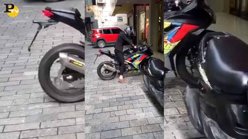 motociclista sfonda vetrina negozio video