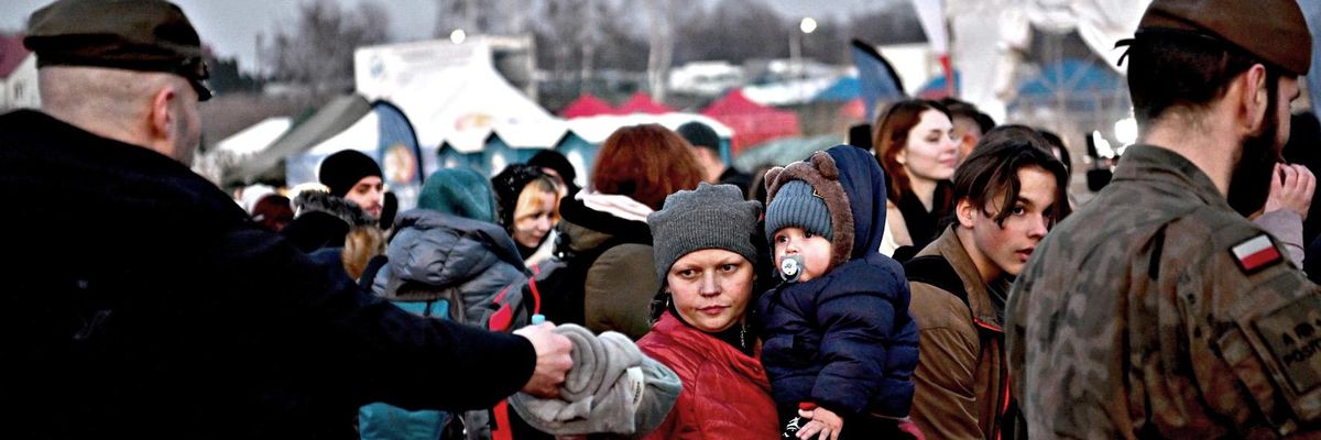 ​profughi ucraini al confine con la Polonia