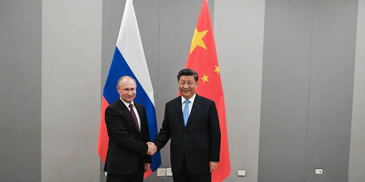 ​Vladimir Putin con Xi Jinping