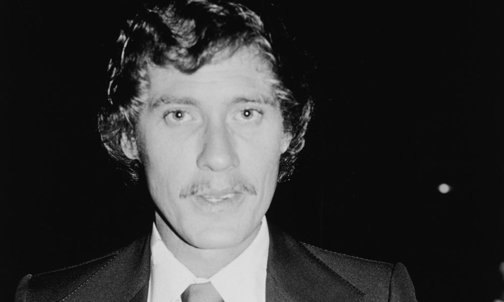 John Holmes, finiva 25 anni fa la vita maledetta del re del porno