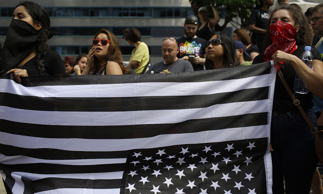 Usa, cortei contro le violenze di Charlottesville e il silenzio di Trump – Foto Usa, cortei contro le violenze di Charlottesville e il silenzio di Trump – Foto