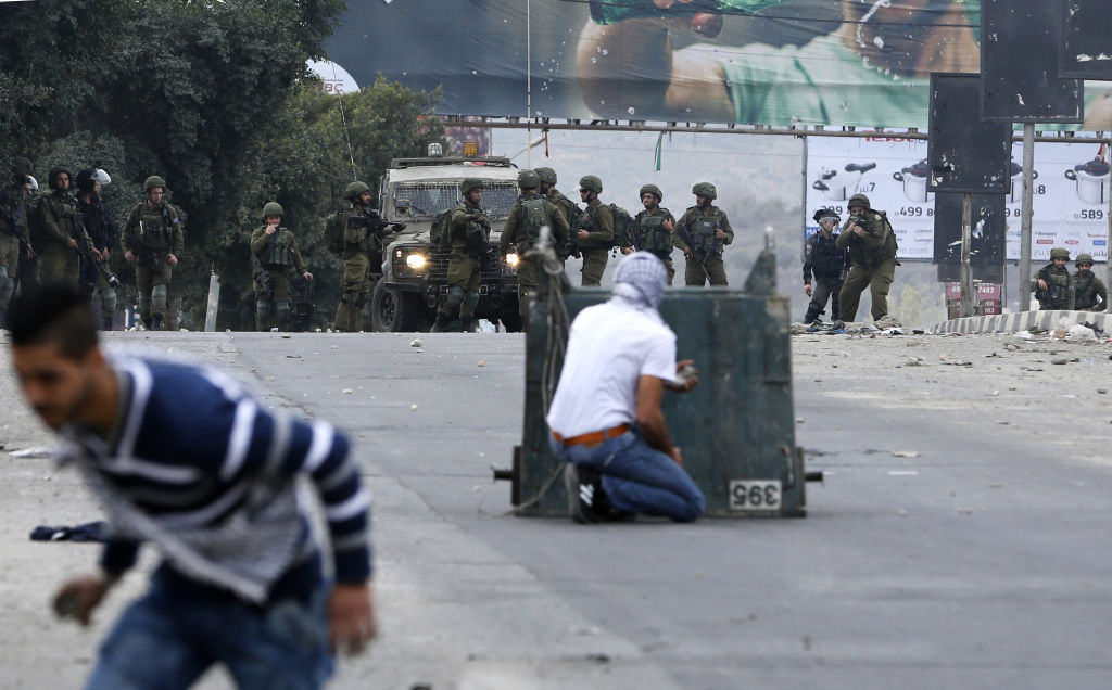 Israliani contro palestinesi: le foto degli scontri
