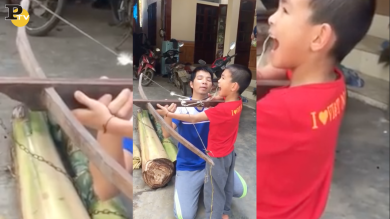 Toglie il dente al figlio con una balestra | video