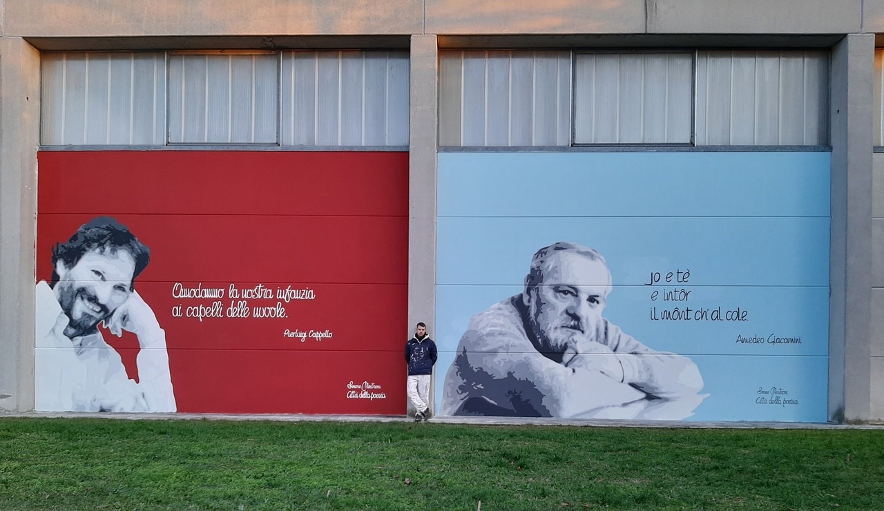 Il graffitaro che porta la poesia sulle saracinesche