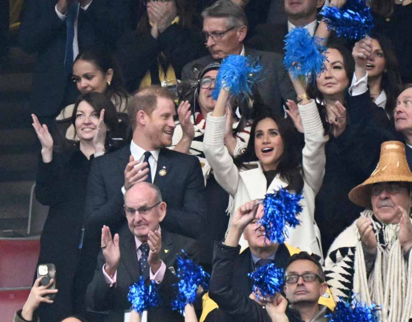 Meghan Markle, il bacio a Harry d’Inghilterra è un messaggio al mondo (e a Trump) – Foto