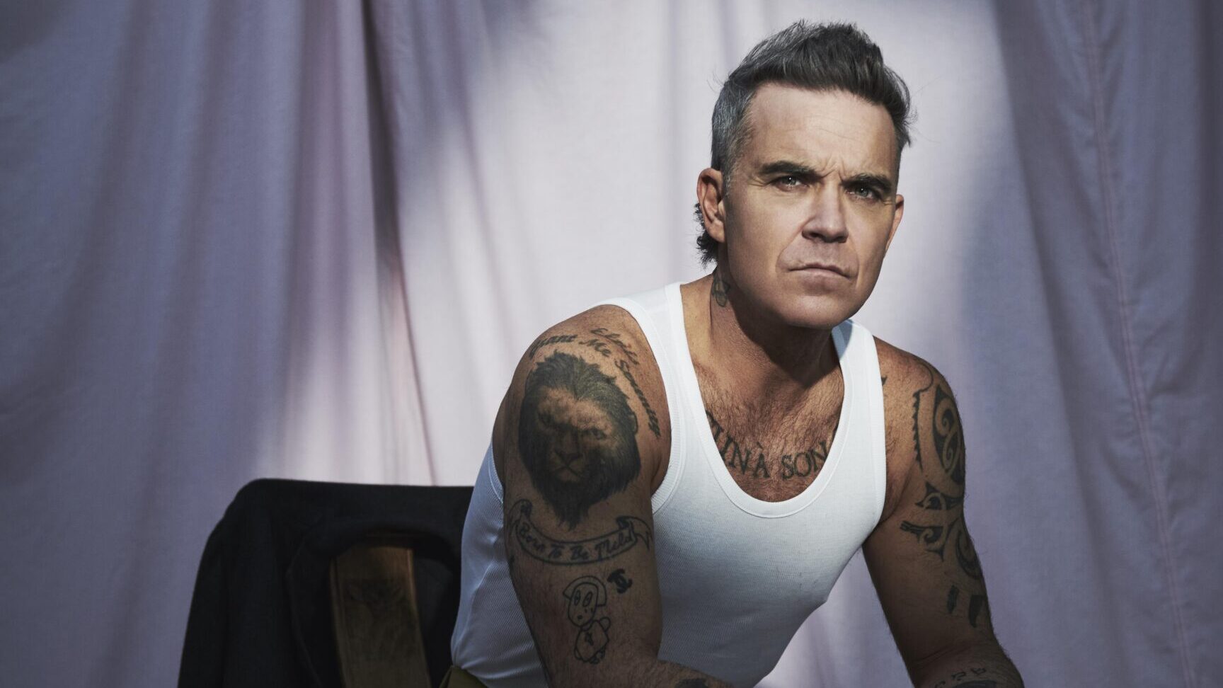 Robbie Williams: esce Rocket, il singolo con il re della chitarra metal